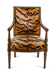 A French Empire Style Carved Mahogany Fauteuil
Height 34 1/2 inches.