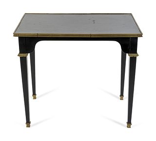 A French Empire Style Gilt Metal Mounted Ebonized Size Table
Height 26 1/4 x width 30 3/8 x depth 19 7/8 inches.