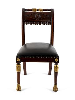 An Empire Style Mahogany and Parcel Gilt Side Chair
Height 37 inches.