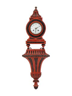 A Louis XV Style Black and Red Painted Bracket Clock
Total height 27 1/2 inches.