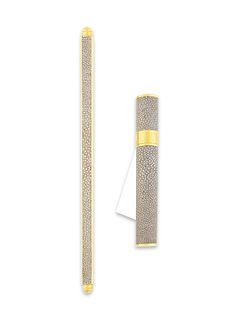 A Shagreen and Brass Cigar Holder and Paperweight
Length of paper weight 11 1/2 inches.