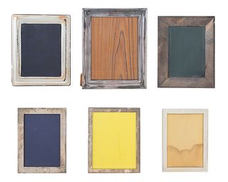 A Collection of Silver Picture Frames
Largest, Height 13 5/8 x width 10 3/4 inches.
