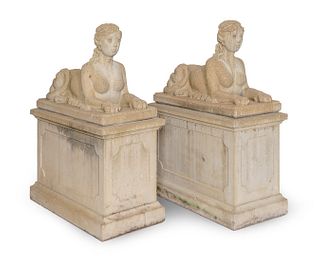 A Pair of Cast Stone Female Sphinxes on Pedestal Bases
Height 40 x width 14 1/2 x depth 30 1/2 inches.