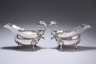A PAIR OF EARLY VICTORIAN SILVER SAUCEBOATS
 by Ed