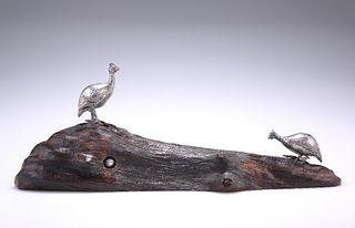 A CONTEMPORARY SILVER SCULPTURE OF TWO GUINEA FOWL