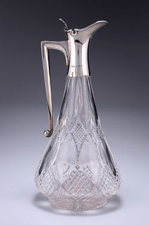 A GEORGE V SILVER-MOUNTED CUT-GLASS CLARET JUG
 by