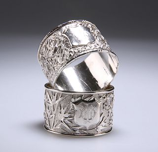 TWO CHINESE SILVER NAPKIN RINGS
 by Woshing, Shang