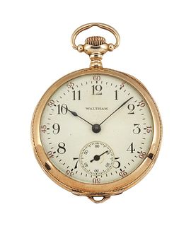 A SMALL GOLD CASED FOB WATCH
 by Waltham, stamped 