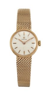 A LADY'S GOLD WRIST WATCH
 by Omega
 Circular dial
