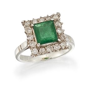 AN EMERALD AND DIAMOND CLUSTER RING
 The square-cu