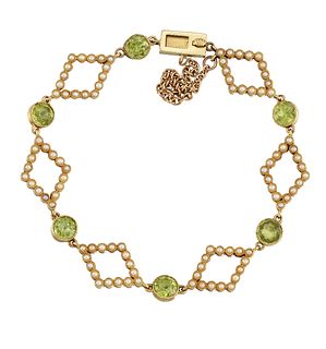A PERIDOT AND SEED PEARL BRACELET
 The collet-set 