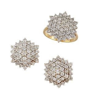 A DIAMOND-SET RING AND EARRING SUITE
 Each designe