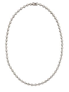 A DIAMOND NECKLACE, BY CARTIER
 Formed from a cont