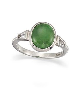 A JADEITE AND DIAMOND RING
 The collet-set cabocho