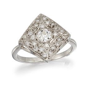 A DIAMOND CLUSTER RING
 The lozenge-shaped plaque,
