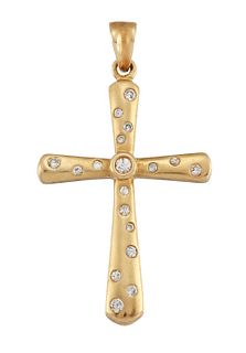 A DIAMOND-SET CRUCIFIX PENDANT
 Of rounded outline