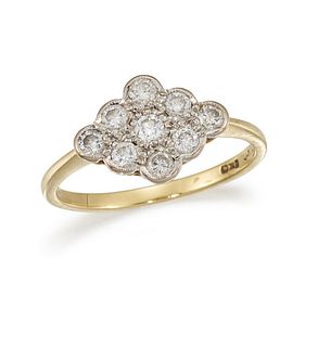 A DIAMOND CLUSTER RING
 Designed as a scalloped pl