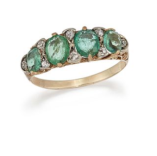 AN EMERALD AND DIAMOND RING
 Set with four oval-cu