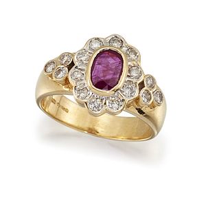 A RUBY AND DIAMOND CLUSTER RING
 The collet-set ov