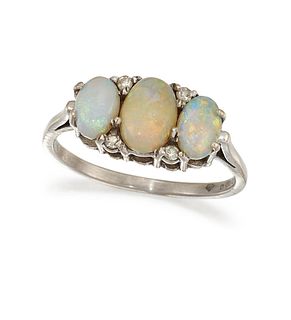 AN OPAL AND DIAMOND RING
 Set with three graduated