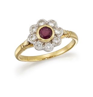 A RUBY AND DIAMOND CLUSTER RING
 The collet-set ci