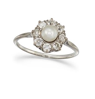 A CULTURED PEARL AND DIAMOND RING
 The 5.01mm cult