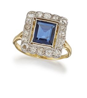 A SAPPHIRE AND DIAMOND CLUSTER RING
 The millegrai