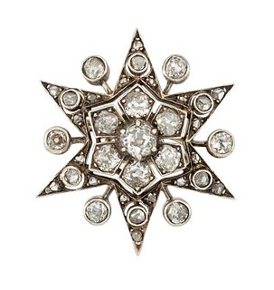 A DIAMOND STAR BROOCH
 The six-rayed star, set wit