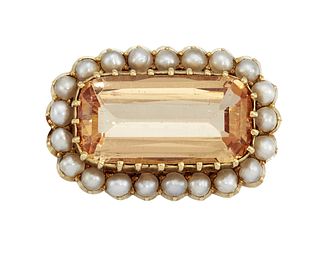 A TOPAZ AND HALF PEARL BROOCH
 The rectangular-cut