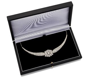 A DIAMOND NECKLACE
 The scalloped central panel, f