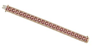 A RUBY AND DIAMOND BRACELET
 The articulated strap