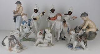 Grouping of Signed Porcelain Figures.