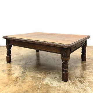 CONTINENTAL, CARVED OAK LOW COFFEE TABLE