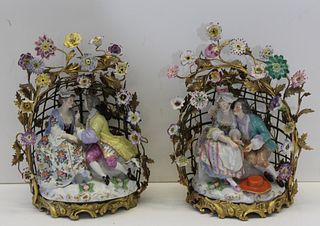 Pair Of Porcelain Groupings Mounted In Gilt Metal