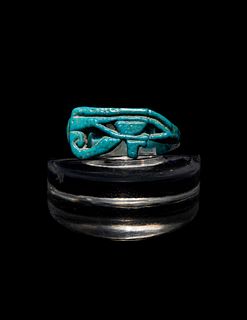 An Egyptian Faience Finger Ring with a Wadjet Eye
Diameter 7/8 inch.
