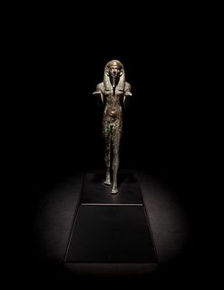 An Egyptian Bronze King or Deity as a Nude Offering-Bearer
