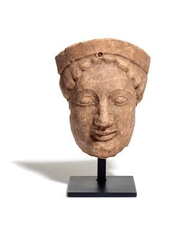 A Greek Terra Cotta Protome
Height 6 1/4 inches.