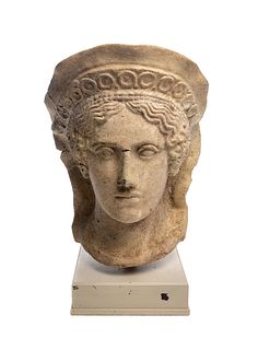 An Etruscan Terra Cotta Votive Head of a Veiled Woman