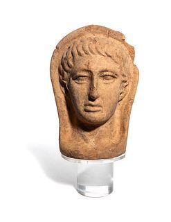 An Etruscan Terra Cotta Votive Head of a Man 