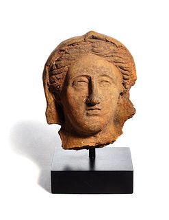 An Etruscan Terra Cotta Votive Head of a Woman 