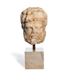 A Roman Marble Head of a Bearded Male, Perhaps Hercules