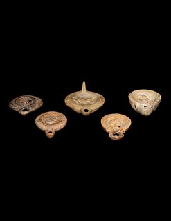 Five Roman Molded Terra Cotta Oil Lamps