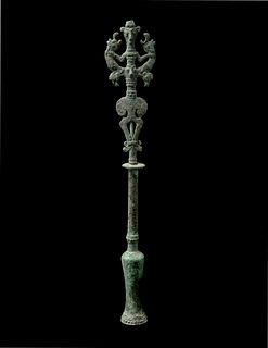 A Luristan Bronze Standard Finial with the Master of the Animals
Height 14 inches.