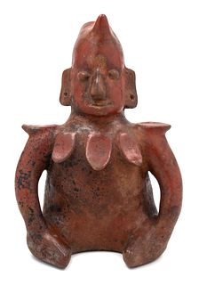 A Colima Pottery Figural Vessel 
Height 12 1/8 inches.