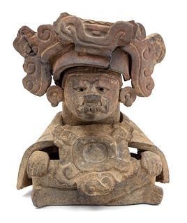 A Zapotec Pottery Figural Funerary Urn
Height 6 1/2 inches.