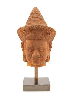 A Cambodian Sandstone Head of a Deity