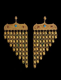 A Pair of Egyptian or Near Eastern Gilt Metal Earrings
Width 4 inches.