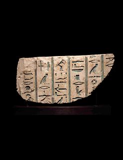 An Egyptian Limestone Relief with an Inscription