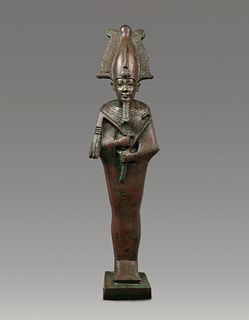An Egyptian Bronze Osiris
Height 11 3/4 inches.