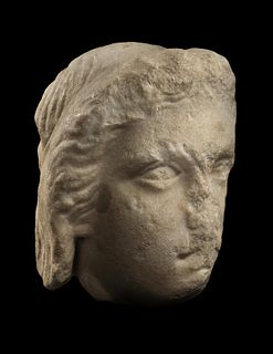 A Greek Fragmentary Marble Male Head
Height 7 7/8 inches.